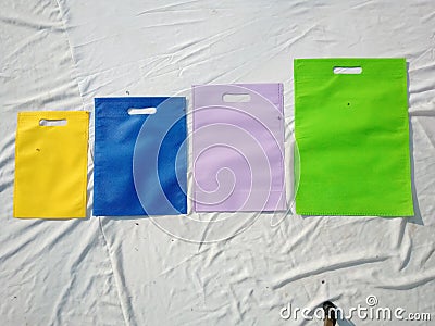 Set of colorful shopping bags on white background. Amazing color eco bags. Non woven fabric bag Stock Photo