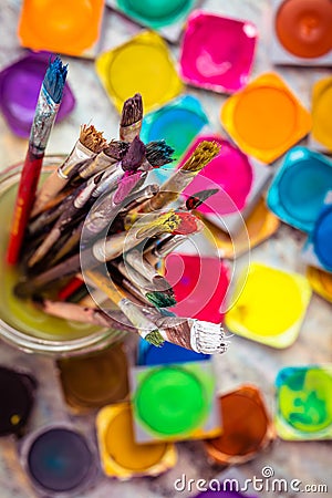 Set of watercolor paints and paintbrushes for painting closeup Stock Photo