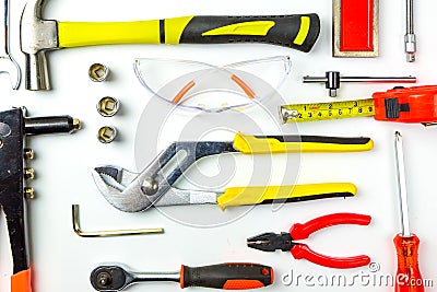 Set of construction tools on white background as wrench, hammer, pliers, socket wrench, spanner, tape measure, electric Stock Photo