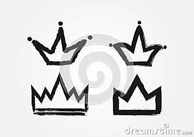 Set of crowns drawn by hand with a rough brush. Grunge. Vector Illustration