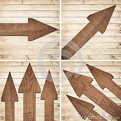 Set of dark brown wooden arrow are on wall Stock Photo