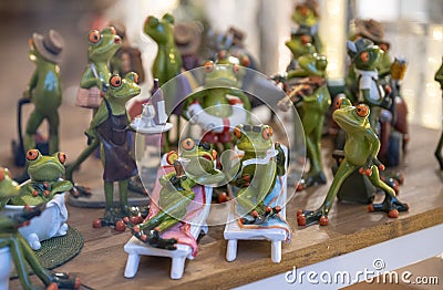 Set of decoration ceramic frogs in various funny poses for home and garden Stock Photo