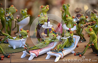 Set of decoration ceramic frogs in various funny poses for home and garden Stock Photo