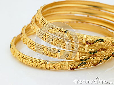 Set of designed gold bangles Stock Photo