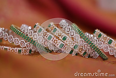 Set of diamond studded gold bangles Stock Photo