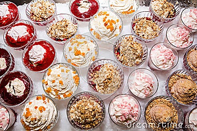 Set of different desserts on the table, top view. Stock Photo