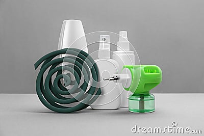 Set of different insect repellents on grey background Stock Photo