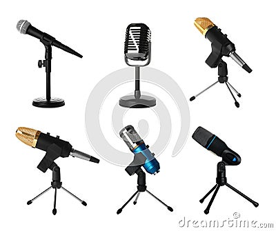 Set of different professional microphones in holders Stock Photo