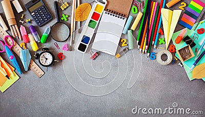 Set of different stationery, alarm clock and supplies on gray background. Back to school concept. Banner format. Top view Stock Photo