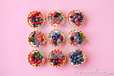 Set of different tartlets or cake with cream cheese, honey and summer berry. Pastry dessert top view. Flat lay Stock Photo