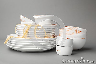 Set of dirty dishes with spaghetti leftovers Stock Photo