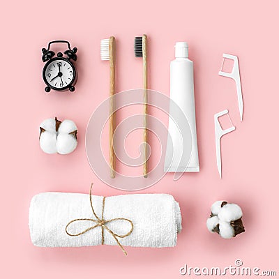 Set of eco-friendly toothbrushes, toothpaste and other tools on pink background. Stock Photo