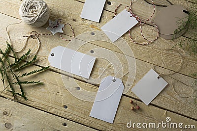 Set of empty paper price tags, wooden background Stock Photo