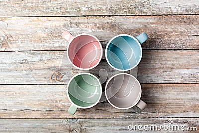 Empty pastel colored mugs Stock Photo