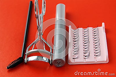 Set for eyelashes, mascara, tongs, brush Stock Photo