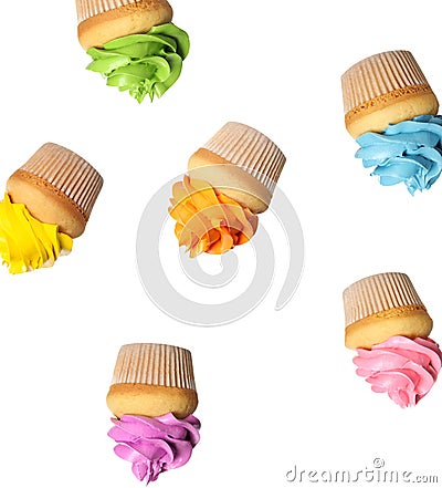 Set of falling delicious birthday cupcakes on background Stock Photo