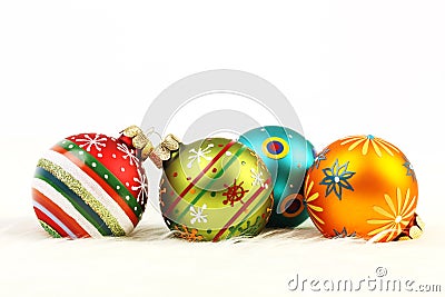 Set of four colorful Christmas balls on white background Stock Photo