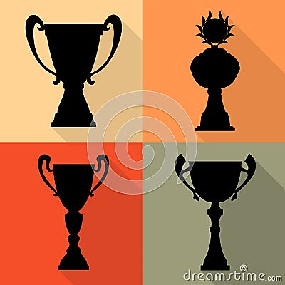 Set of four vector trophy champion cups in flat style. Championship prizes for first place. Vector Illustration