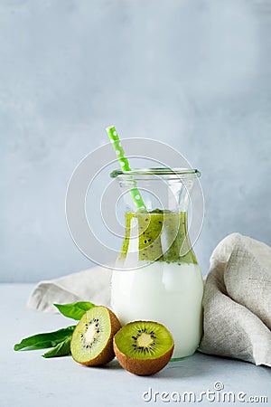 Set of fresh smoothies. Banana, cherries, kiwi and spinach for healthy eating, detox, diet food. Selective focus Stock Photo