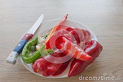 Set of fresh vegetables isolated on wood table background. Green and red bell pepper backgro Stock Photo