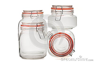 A set of glass jars with tight-fitting lids for bulk products on a white background. Stock Photo