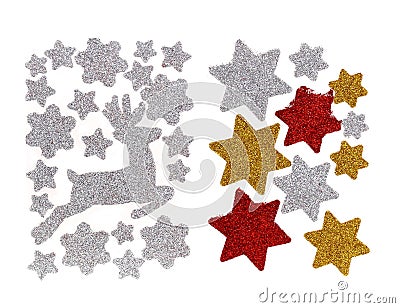 Set of glitter Christmas stickers isolated on a white background. They are white, gold and red stars and running Stock Photo