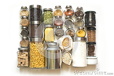 Set of homemade stocks of spices, cereals, coffee, pasta, flour, sugar on white table top. Storage and save in glass jar Stock Photo