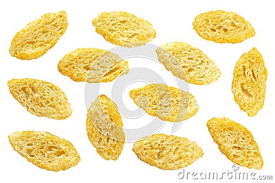 Set of homemade white bread croutons isolated on white background, top view. Crispy bread cubes, croutons isolated on Stock Photo