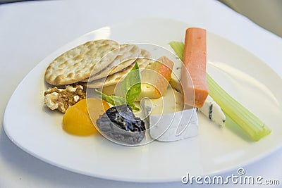 Set inflight meal appetizer on a tray, on a white table Stock Photo