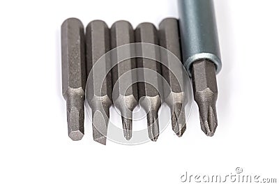 Set of different interchangeable bits for mini screwdriver, close-up Stock Photo