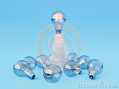 a light bulb taking off over others lying on the ground Stock Photo