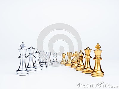 Set of luxury golden and silver chess pieces isolated on white background. Stock Photo