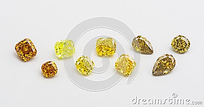 Set of luxury yellow and brown transparent sparkling gemstones of various cut shape diamonds collage on white background Stock Photo