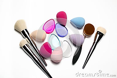 Set of makeup brushes, beauty blenders, silicone sponges and ova Stock Photo
