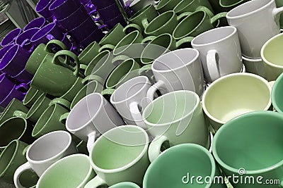 Set of many empty cups different colors abstract background Stock Photo
