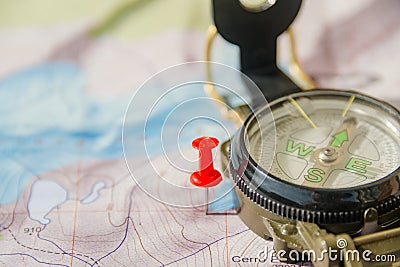 Set of map, red push pin and compass for successful traveler Stock Photo