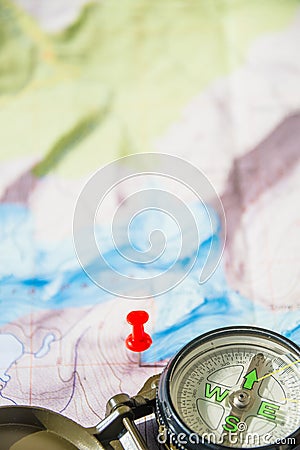 Set of map, red push pin and compass for successful traveler Stock Photo