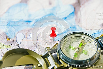 Set of map, red push pin and compass for successful traveler Stock Photo