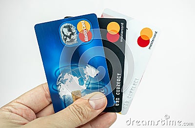Set of Mastercard cards in a hand. Debit cards, money transfer concept. Kiev, Ukraine - August, 2020 Editorial Stock Photo
