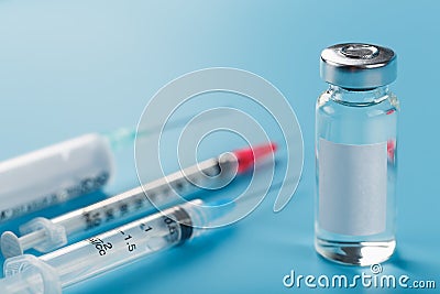 A set of medicines in ampoules and syringes for the treatment of viruses, vaccination and diseases. Stock Photo