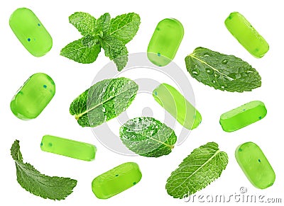 Set of mint hard candies and green leaves on white background Stock Photo