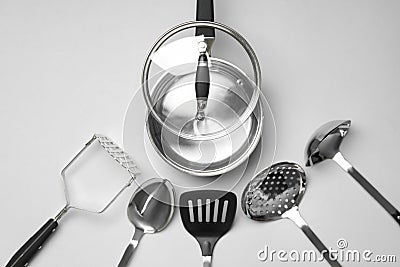 Set of modern cooking utensils on light grey background, flat lay Stock Photo