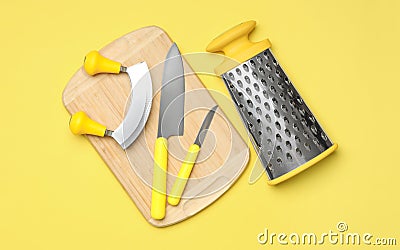 Set of modern cooking utensils on yellow background, flat lay Stock Photo