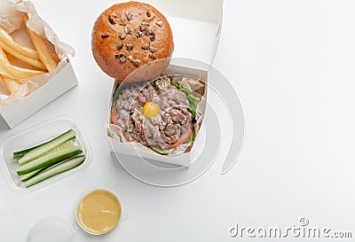 Set of modern takeaway meal, healthy food from restaurant, COVID-19 pandemic, delivery Stock Photo