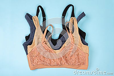 Set of multi-colored lace push-up bras. Glamorous brassieres variety. Top view Stock Photo