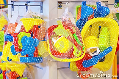 Set of multicolored toys for baby in the shop. Stock Photo