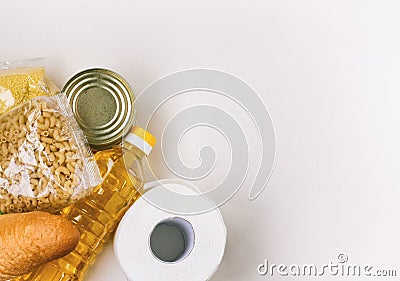 Set of necessary products in quarantine period, cereals, bread, sunflower oil, pasta and toilet paper Stock Photo