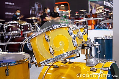 Set of new modern yellow drums in the studio, professional drums Stock Photo