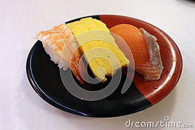 Nigiri sushi of ebi (shrimp or prawn), fish, and egg Stock Photo