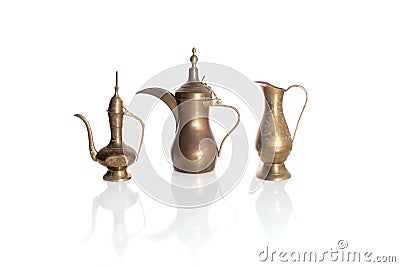 set old different gold metallic jugs, Arabic teapot or coffee pot Stock Photo